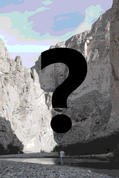 A grayed out picture of a canyon, pixelized, with a question mark in the center.